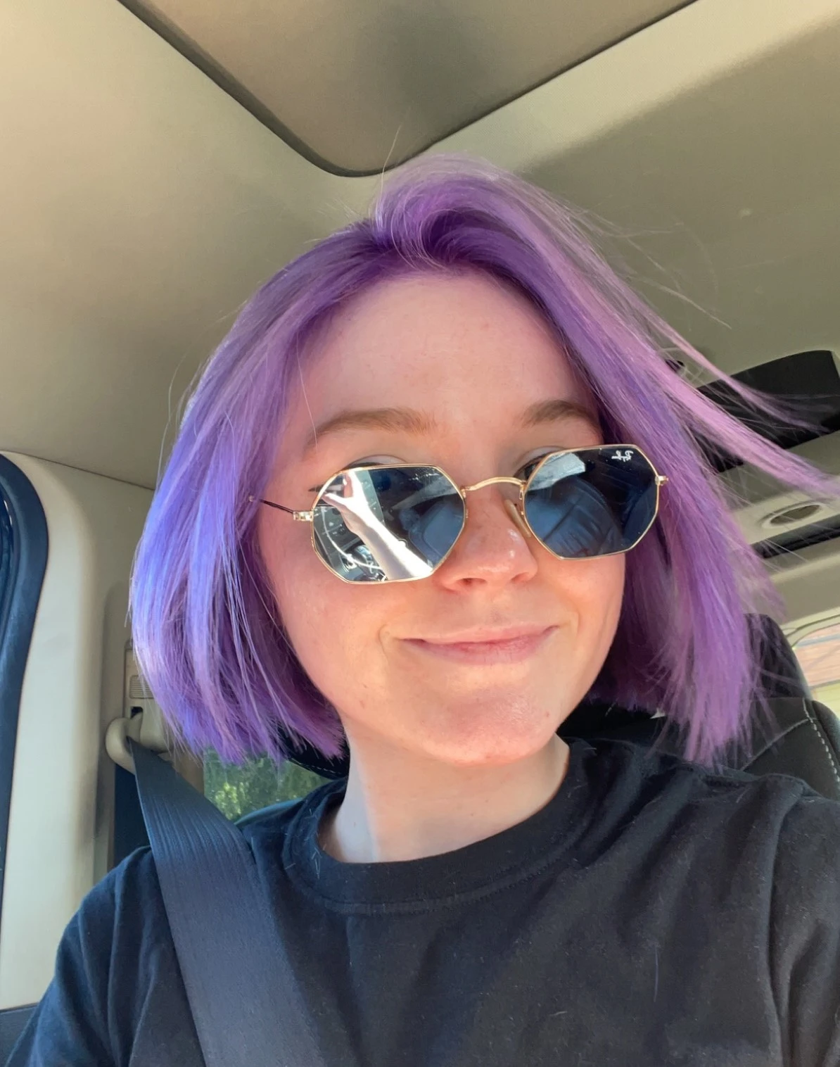 Me wearing sunglasses with purple hair